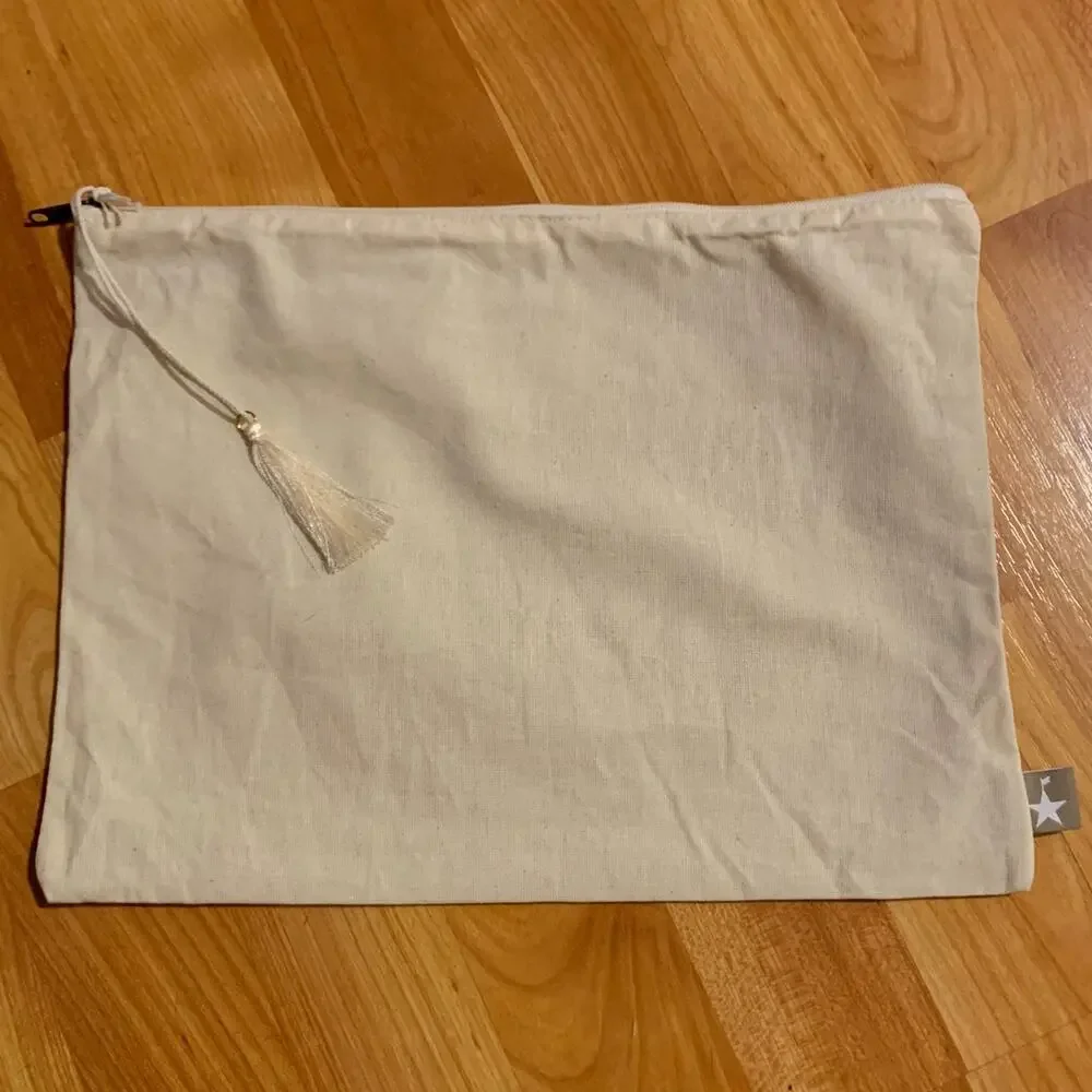 Swimsuit fabric bag with tassel‎